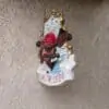 Moulage résine A Suspendre de tête de pirate avec son bateau et son trésor en arrière-plan