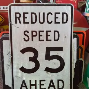panneau de signalisation routiere americain reduce speed 35 ahead 91x61cm